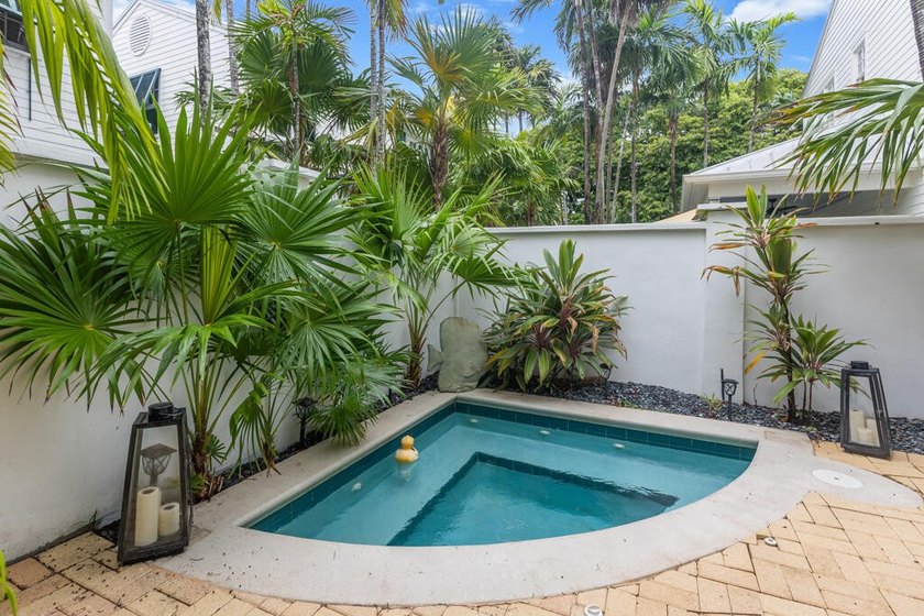 Beautifully appointed home that offers a charming backyard with - photo 40