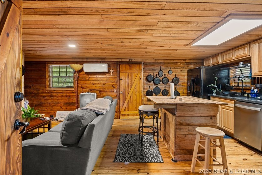 Escape to this adorable 2-bed, 2-bath rustic log cabin tucked - photo 5