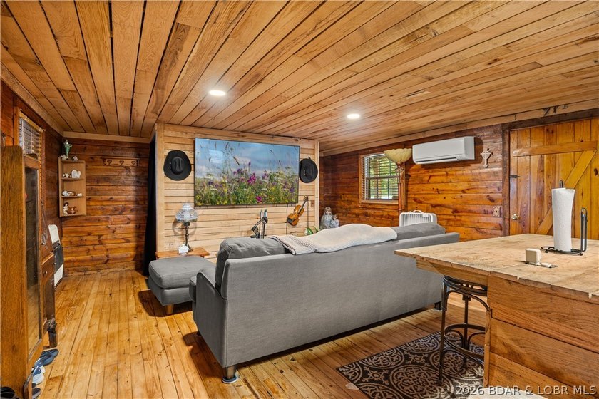 Escape to this adorable 2-bed, 2-bath rustic log cabin tucked - photo 6