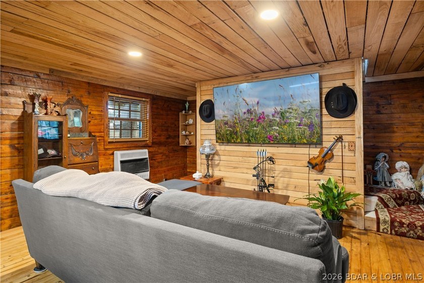 Escape to this adorable 2-bed, 2-bath rustic log cabin tucked - photo 7