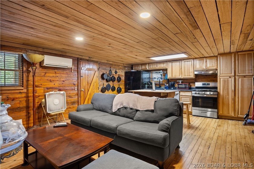 Escape to this adorable 2-bed, 2-bath rustic log cabin tucked - photo 8