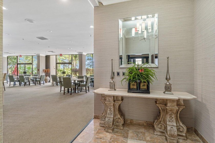 From the moment you enter, you're greeted by panoramic views of - photo 34