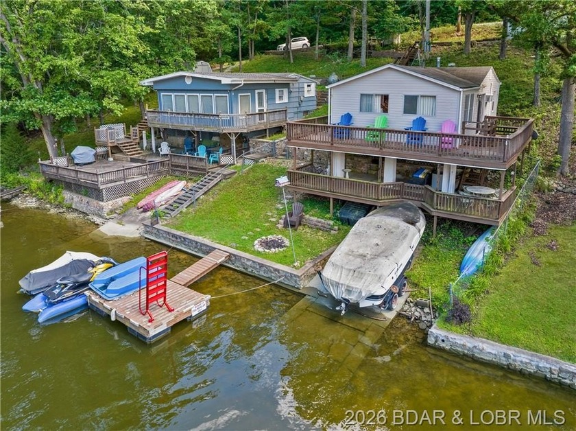 This lake home has it all for 1 price - Boat, 2 PWC's, Paddle - photo 2