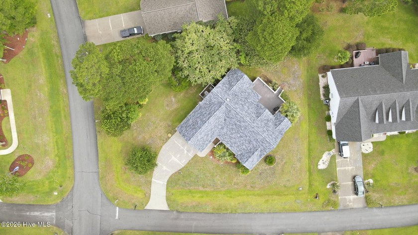 Discover refined coastal living in this beautifully maintained - photo 3