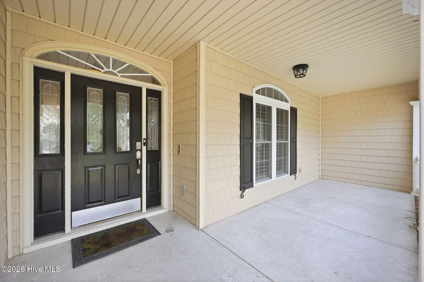Discover refined coastal living in this beautifully maintained - photo 4