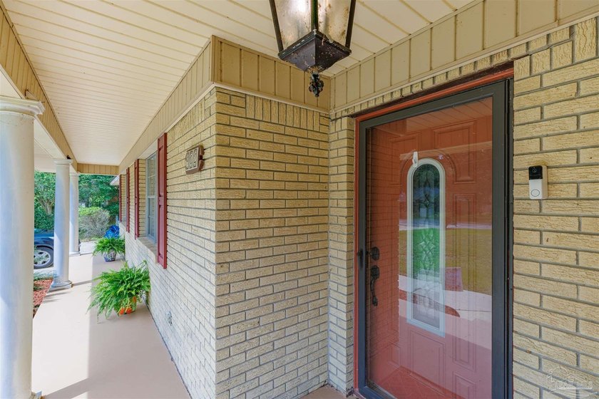 Welcome home to 902 N 75th Avenue, a charming property that - photo 6