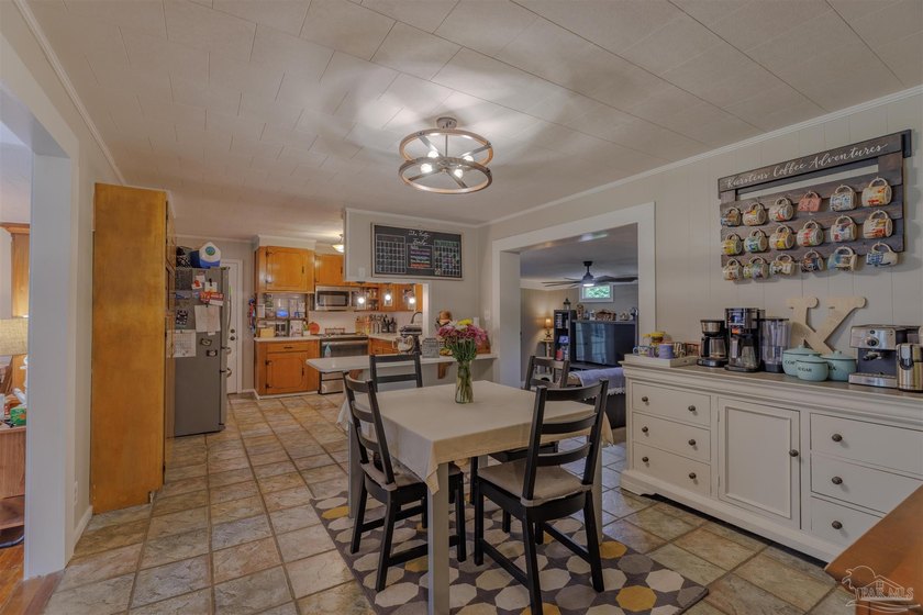 Welcome home to 902 N 75th Avenue, a charming property that - photo 10