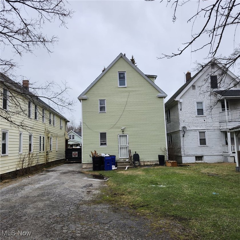 Opportunity awaits with this duplex featuring an upper unit that - photo 2