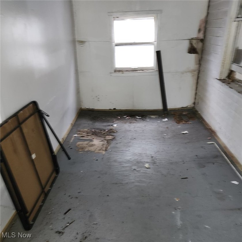 Opportunity awaits with this duplex featuring an upper unit that - photo 6