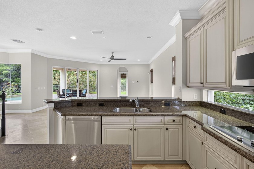 Located on a private cul-de-sac lakefront lot in the exclusive - photo 13