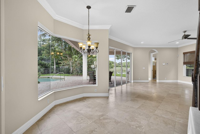Located on a private cul-de-sac lakefront lot in the exclusive - photo 17