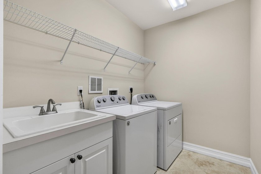 Located on a private cul-de-sac lakefront lot in the exclusive - photo 28