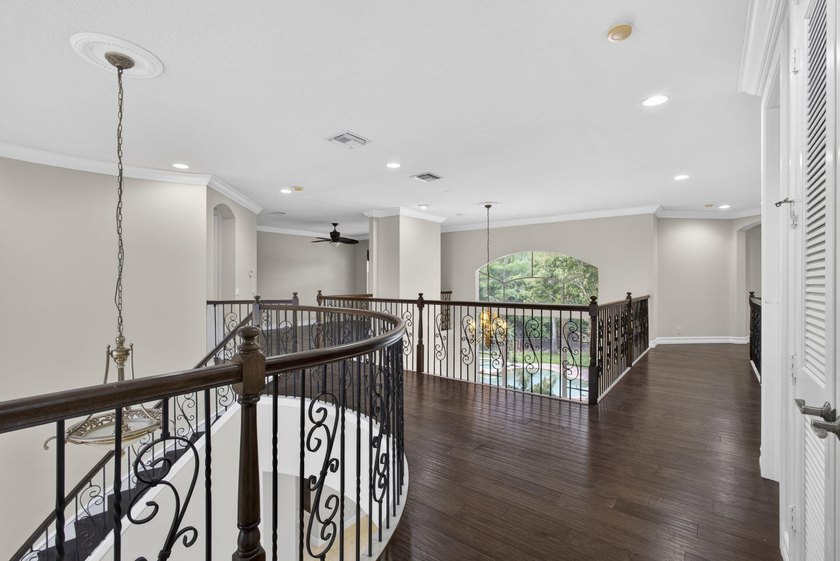 Located on a private cul-de-sac lakefront lot in the exclusive - photo 29