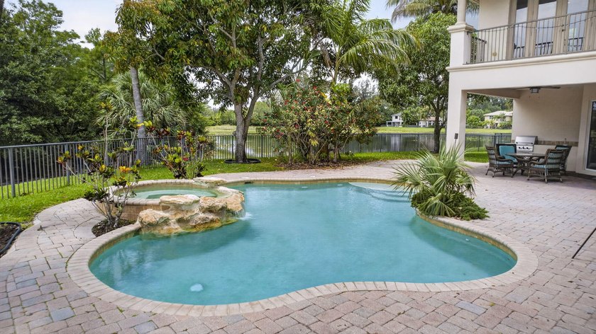 Located on a private cul-de-sac lakefront lot in the exclusive - photo 50