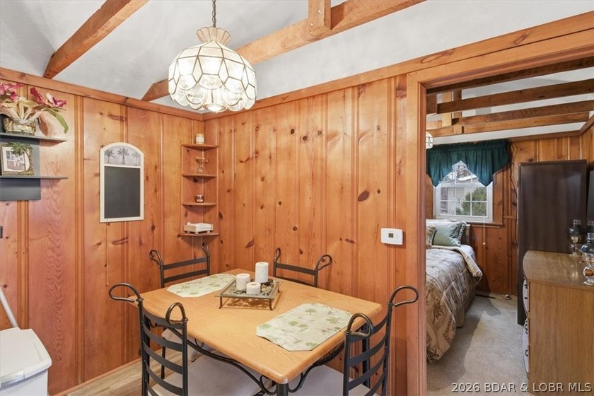 Discover this unique 2-bedroom, 1-bath lakefront cabin offering - photo 11