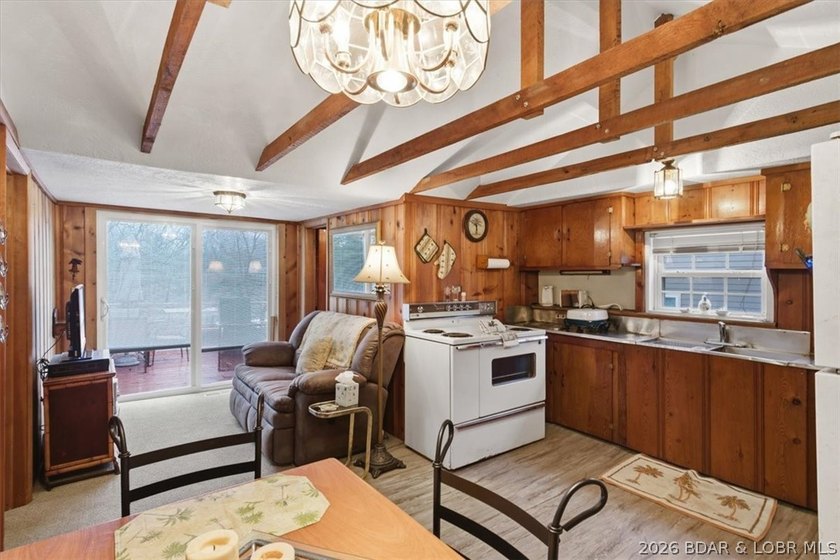 Discover this unique 2-bedroom, 1-bath lakefront cabin offering - photo 12