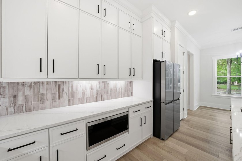 Brand-new construction in Harmony Township, a private Lowcountry - photo 14