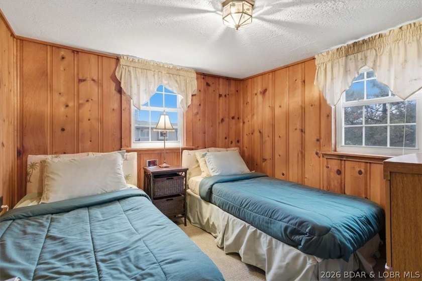 Discover this unique 2-bedroom, 1-bath lakefront cabin offering - photo 19