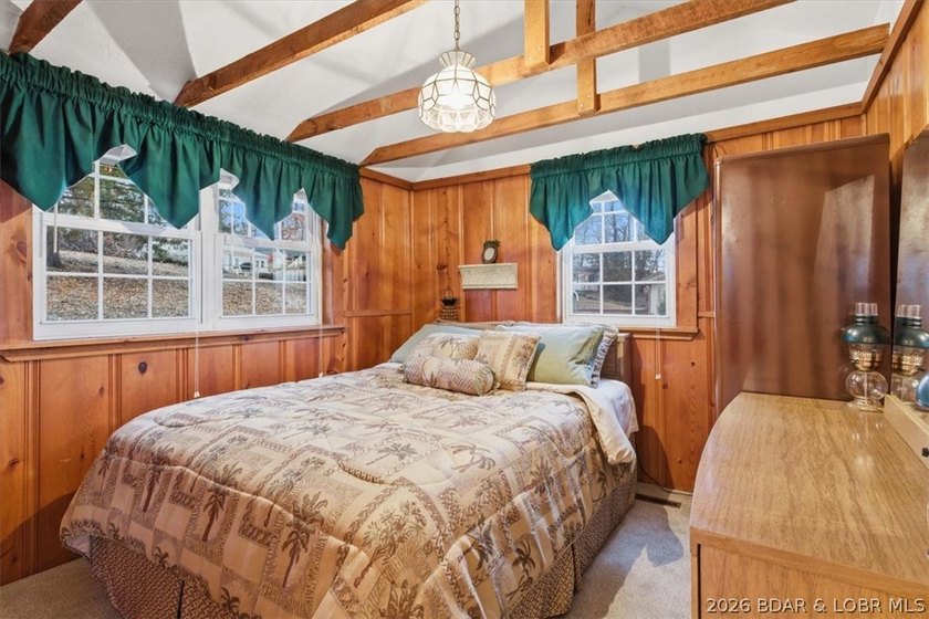 Discover this unique 2-bedroom, 1-bath lakefront cabin offering - photo 22