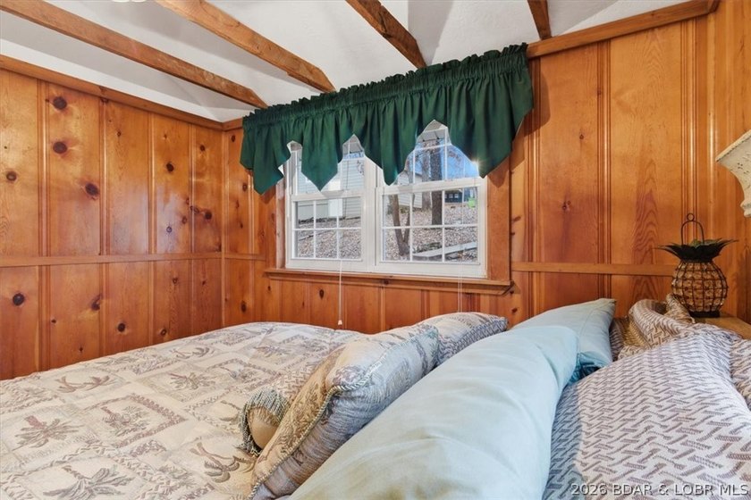 Discover this unique 2-bedroom, 1-bath lakefront cabin offering - photo 24