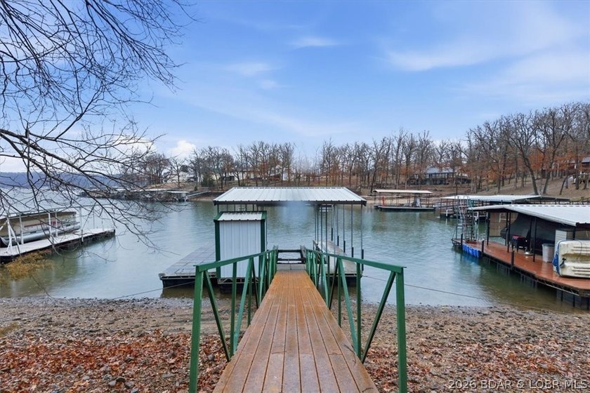 Discover this unique 2-bedroom, 1-bath lakefront cabin offering - photo 29