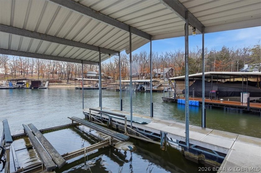Discover this unique 2-bedroom, 1-bath lakefront cabin offering - photo 31