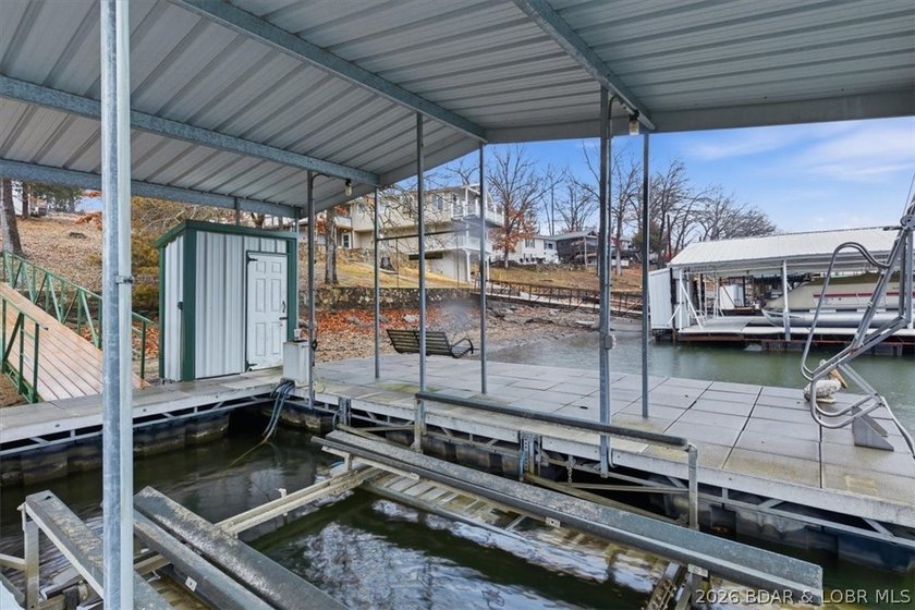Discover this unique 2-bedroom, 1-bath lakefront cabin offering - photo 32