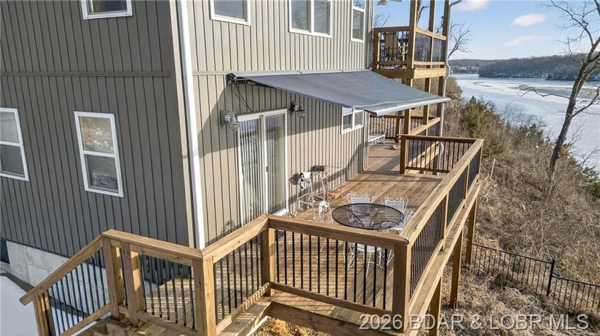 This 3-bedroom, 2.5-bath lakefront home offers over 2,000 square - photo 4