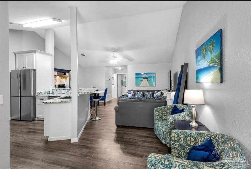INCOME-PRODUCING HOME! Discover this beautifully remodeled - photo 4