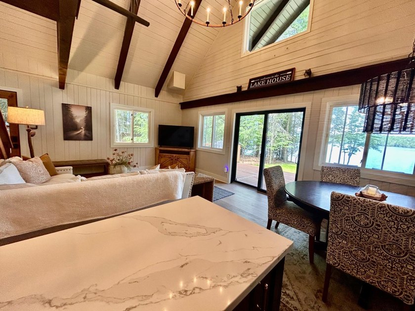 STUNNING FOUR MILE LAKE CHALET! Experience the best of - photo 11