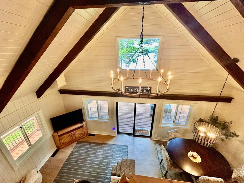 STUNNING FOUR MILE LAKE CHALET! Experience the best of - photo 14