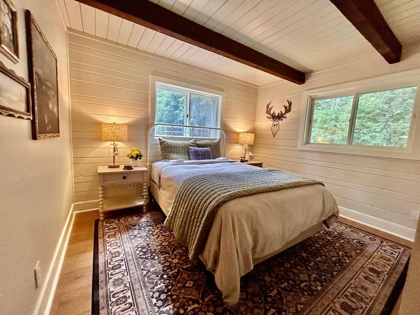 STUNNING FOUR MILE LAKE CHALET! Experience the best of - photo 22