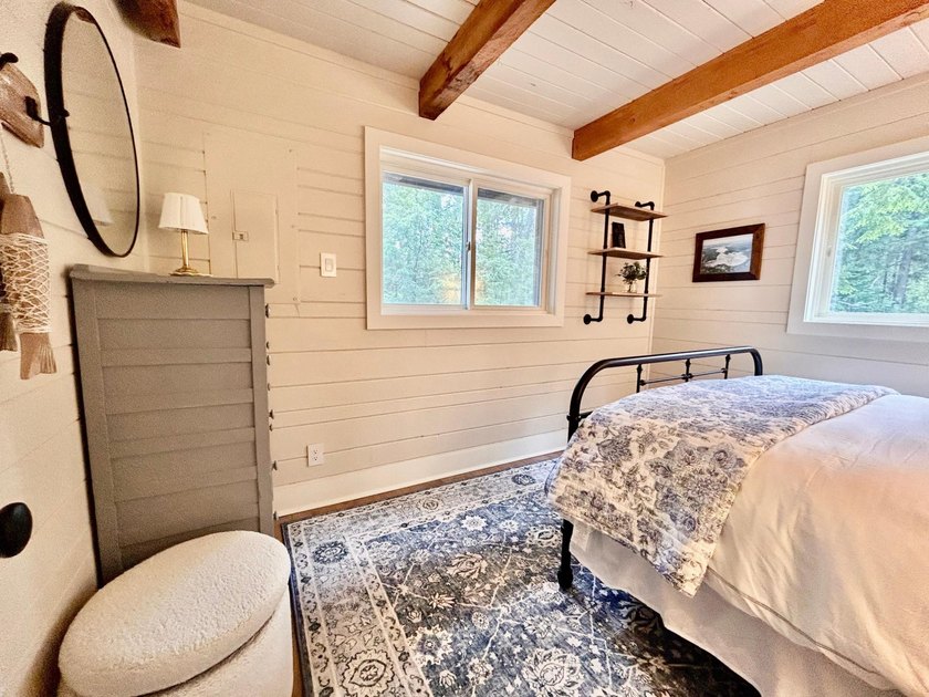 STUNNING FOUR MILE LAKE CHALET! Experience the best of - photo 23
