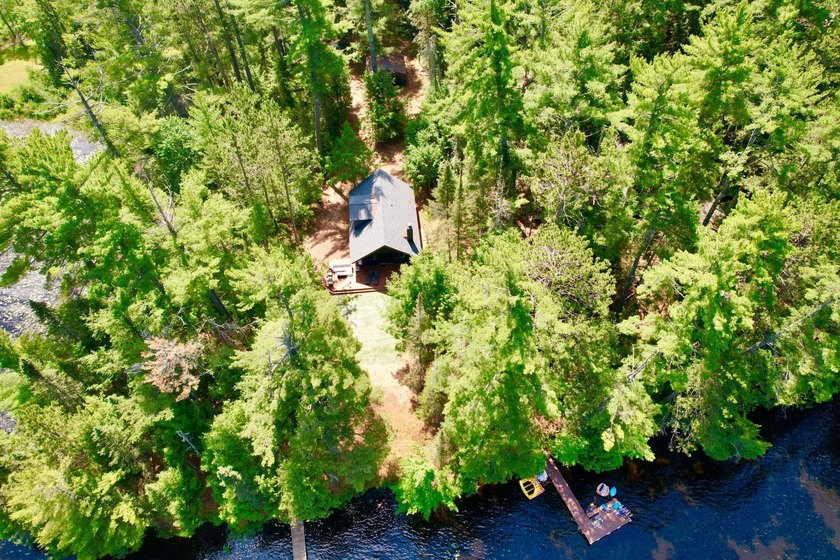 STUNNING FOUR MILE LAKE CHALET! Experience the best of - photo 26