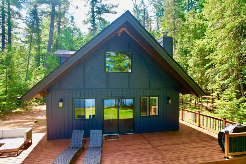 STUNNING FOUR MILE LAKE CHALET! Experience the best of - photo 30
