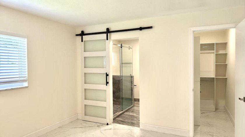 Completely renovated 4-bedroom, 2-bath home with a stunning - photo 12