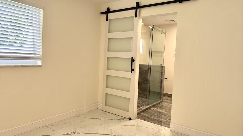 Completely renovated 4-bedroom, 2-bath home with a stunning - photo 14