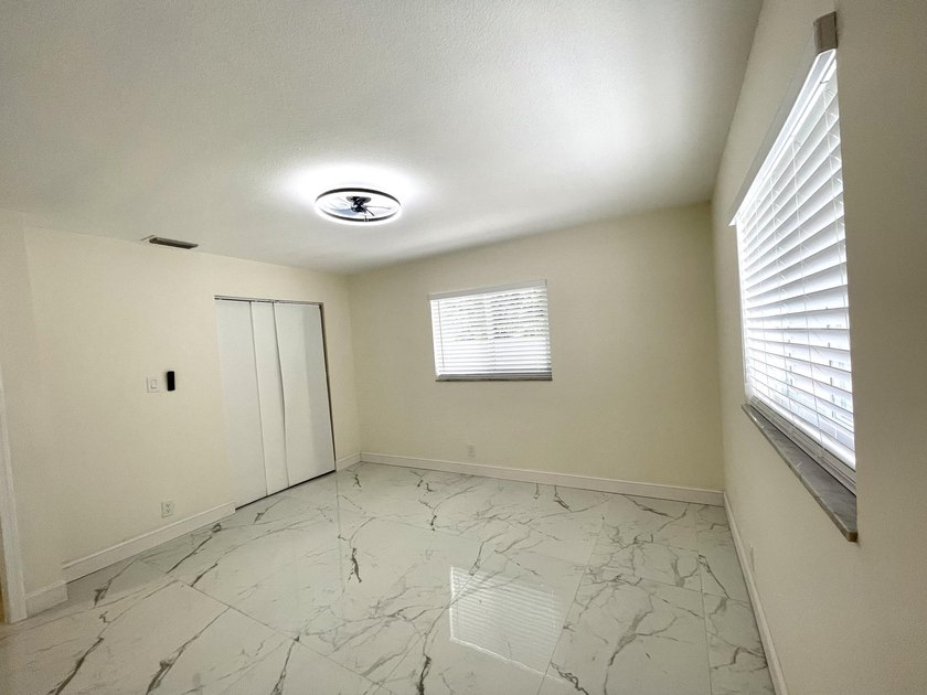 Completely renovated 4-bedroom, 2-bath home with a stunning - photo 19