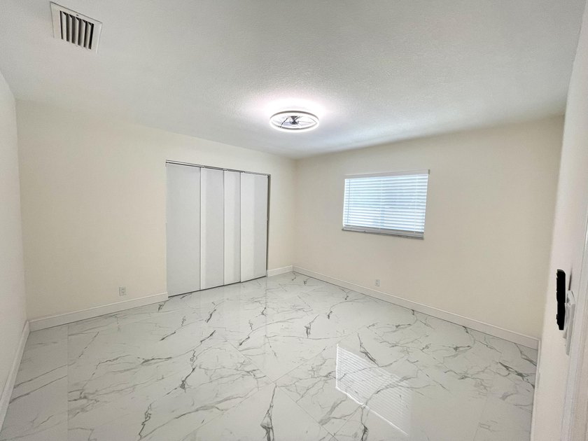Completely renovated 4-bedroom, 2-bath home with a stunning - photo 21