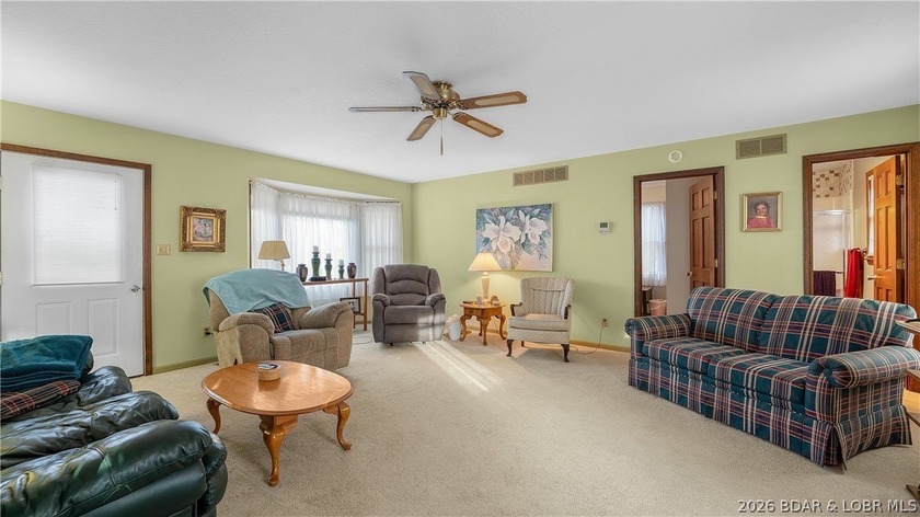 Don't miss this wonderful lake home located at the 8-mile marker - photo 4