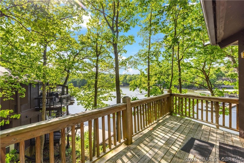 Enjoy treehouse-style living with true lakefront views and all - photo 16