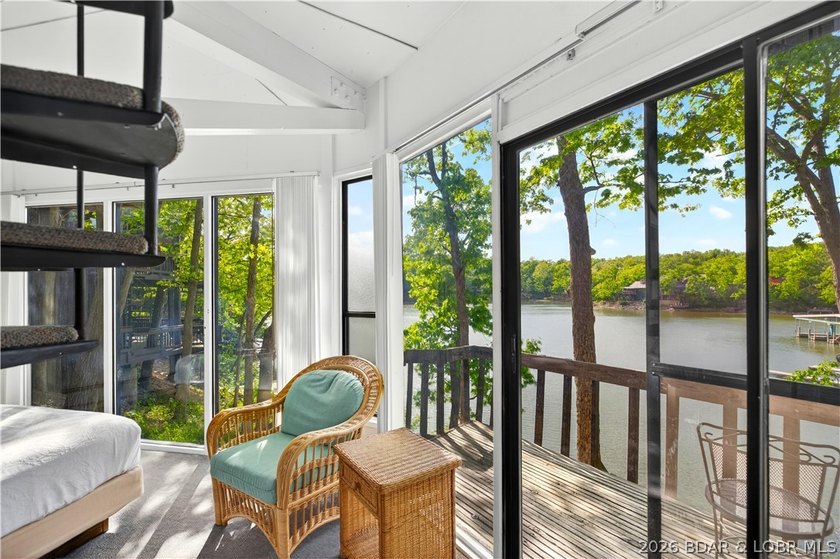 Enjoy treehouse-style living with true lakefront views and all - photo 17