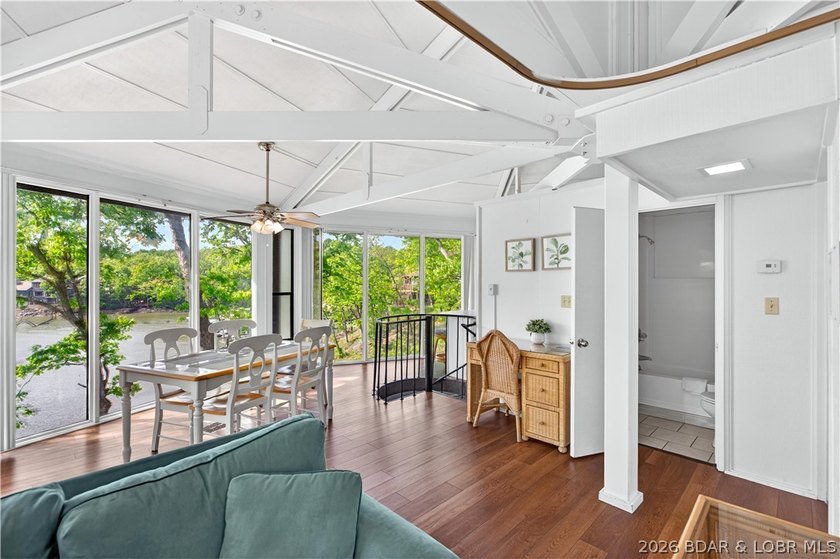 Enjoy treehouse-style living with true lakefront views and all - photo 20