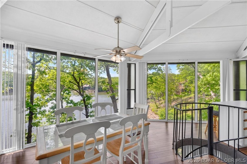 Enjoy treehouse-style living with true lakefront views and all - photo 21