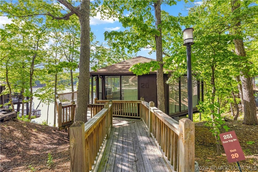 Enjoy treehouse-style living with true lakefront views and all - photo 27
