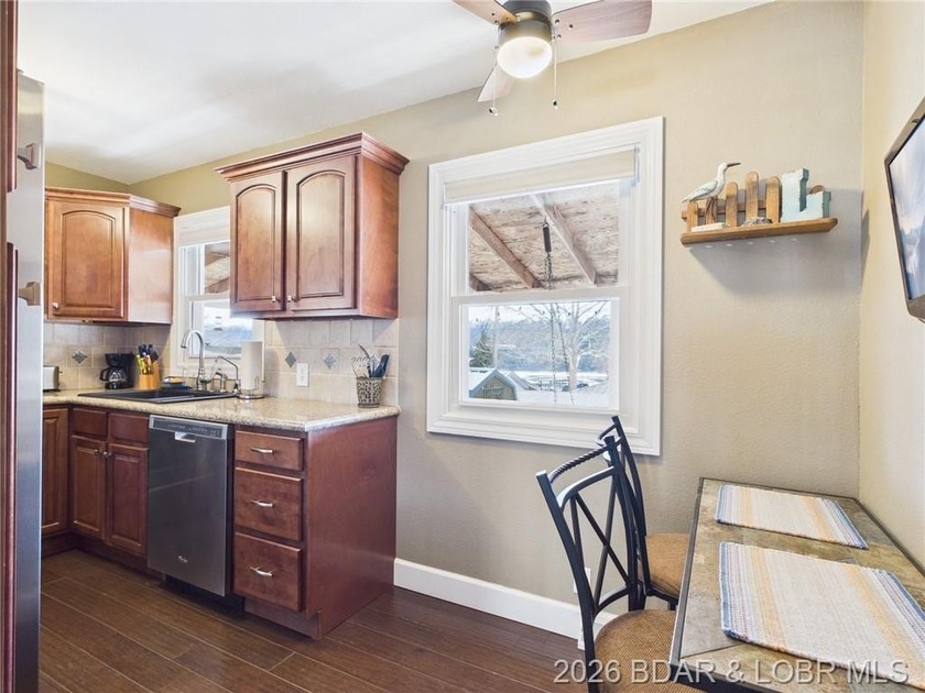 2-bedroom, 1.5 bath home situated on a level 0.13-acre lot with - photo 8