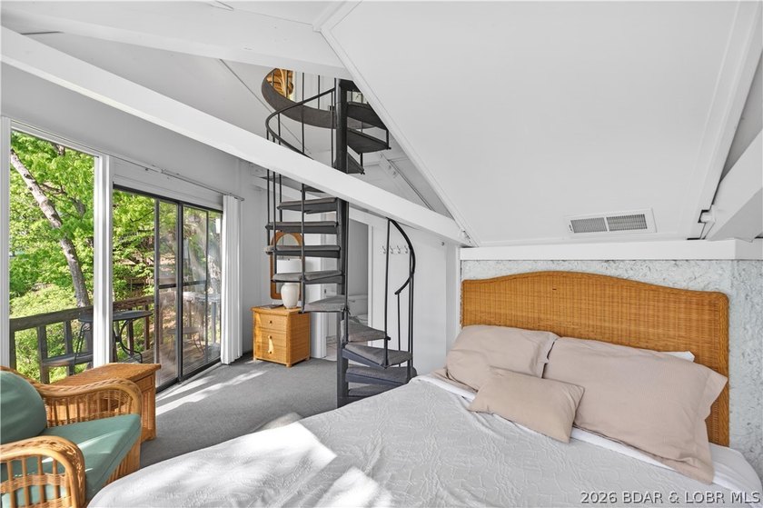 Enjoy treehouse-style living with true lakefront views and all - photo 35