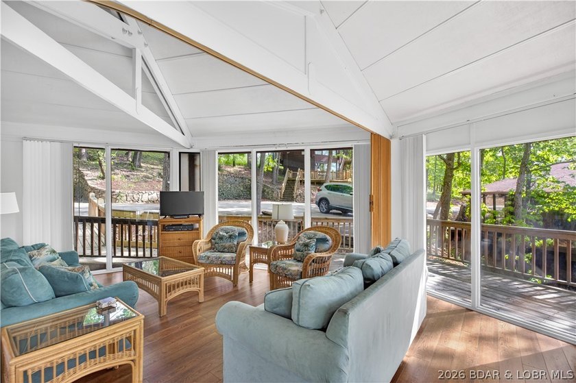 Enjoy treehouse-style living with true lakefront views and all - photo 43