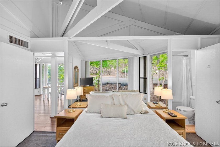 Enjoy treehouse-style living with true lakefront views and all - photo 46