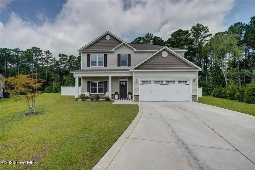 Move-in-ready 4 bedroom, 2.5 bath home perfectly tucked in the - photo 3